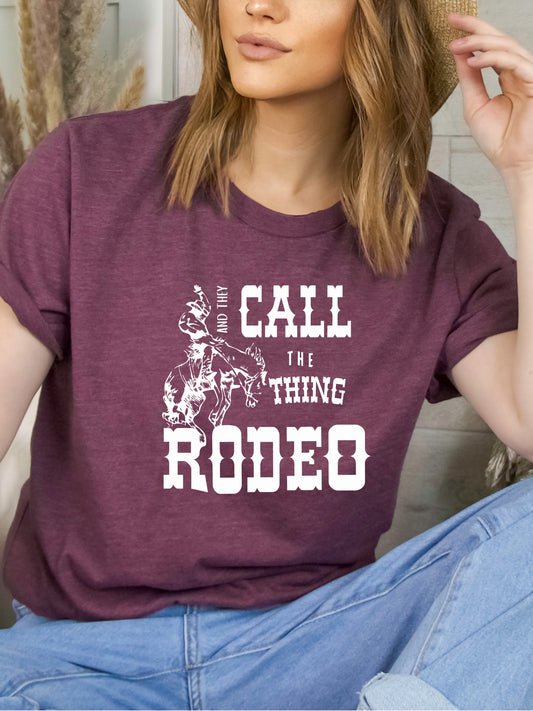 They Call it Rodeo - Relaxed Fit Unisex Tee Heather Maroon