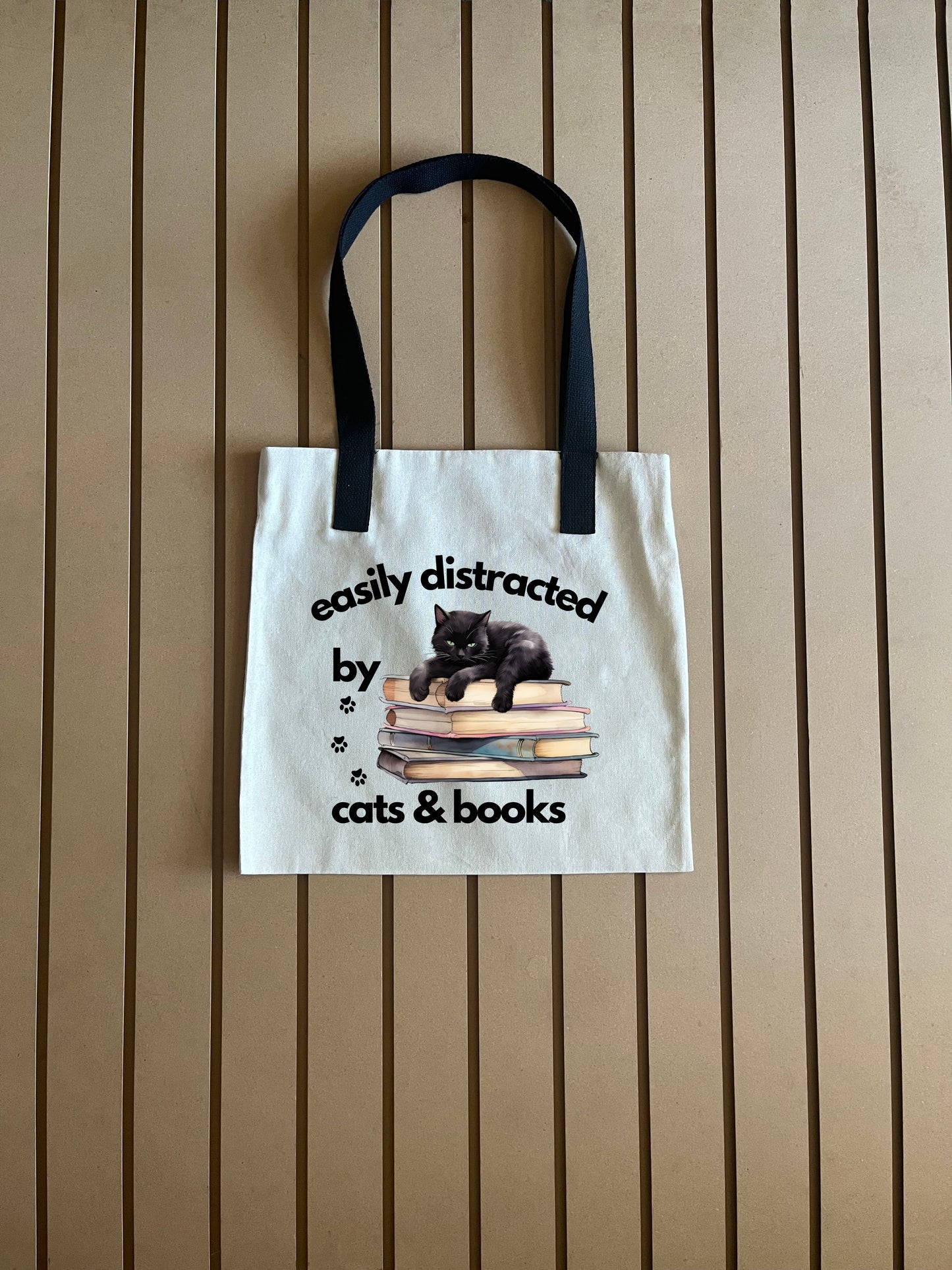 Easily distracted at sleeping on multi books - 43 - Tote Bag