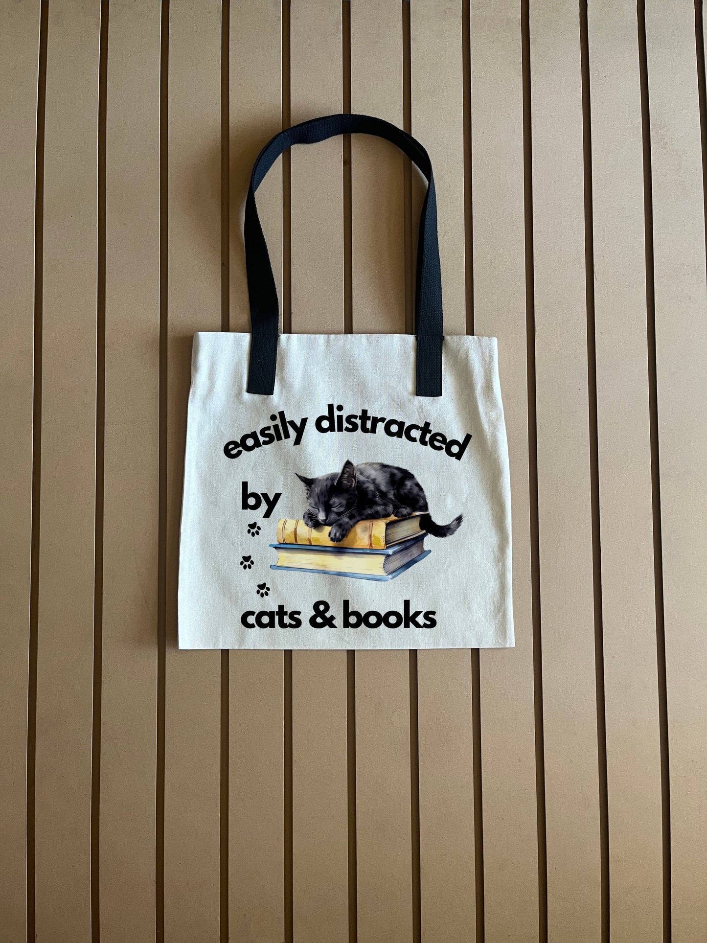 Easily distracted at sleeping on multi books - 44 - Tote Bag
