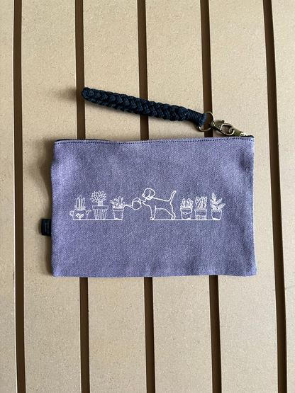 Dog watering plants - Colour Pouch